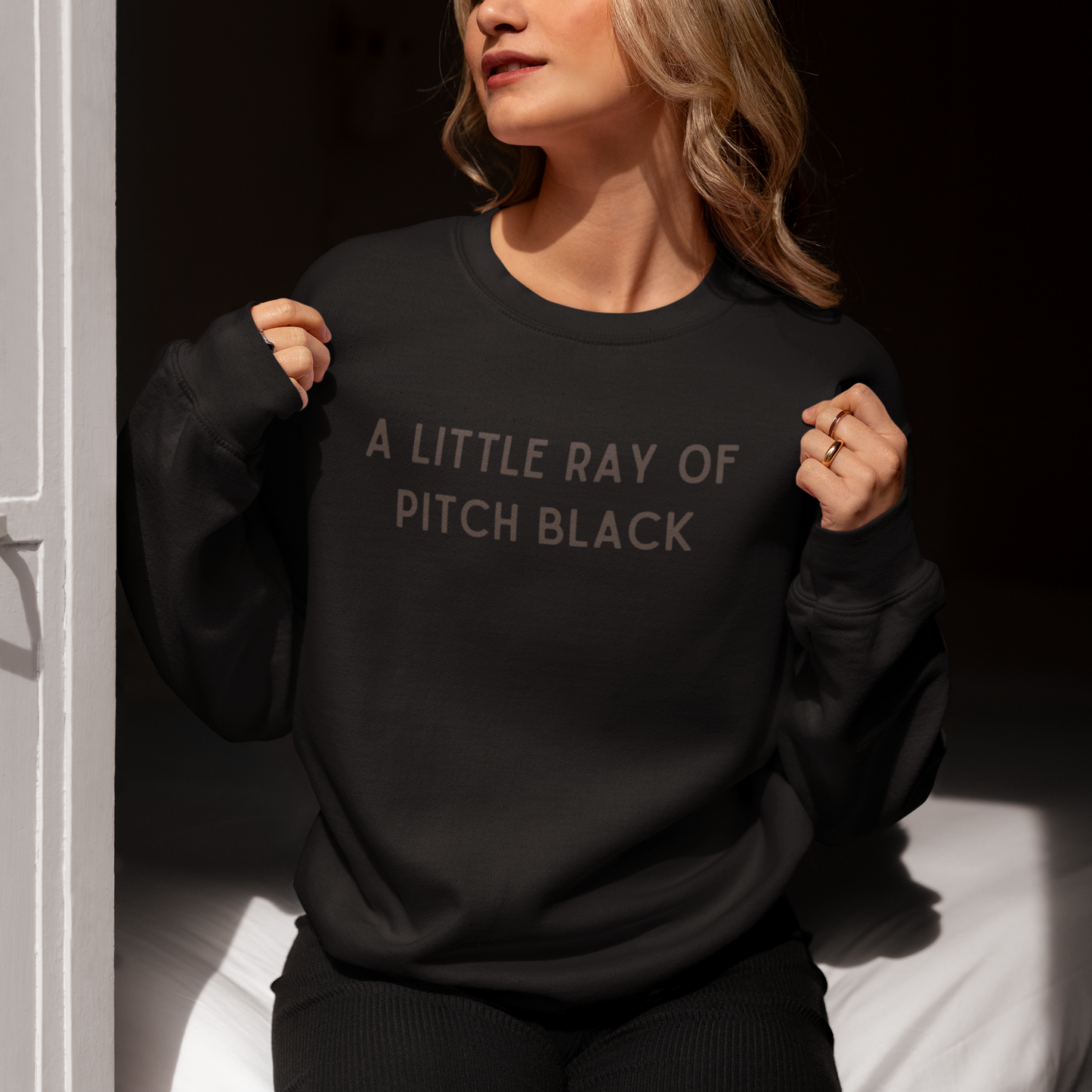 A LIttle Ray of Pitch Black Sweatshirt